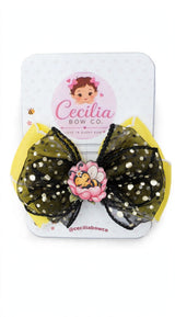 Yellow and black bow with pink flower and sleeping bee centerpiece